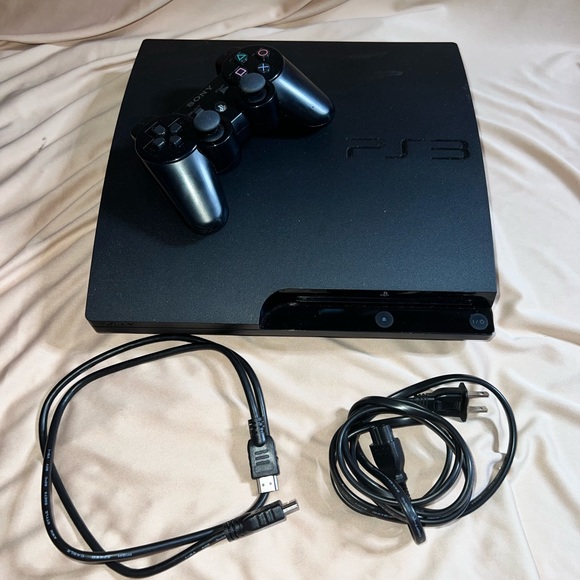 PlayStation 3 Slim for w/3 free games  ! Great Condition!